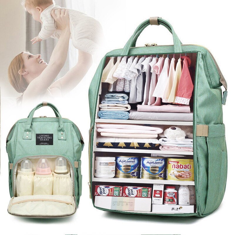 Mint green diaper backpack with a visual cutaway showing organized compartments for clothes, baby bottles, formula, and snacks.