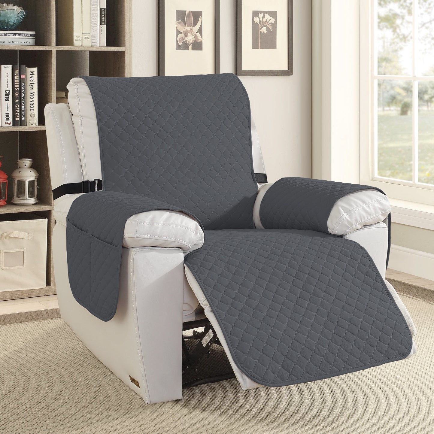Quilted gray recliner chair cover installed on beige recliner in bright living room, front view