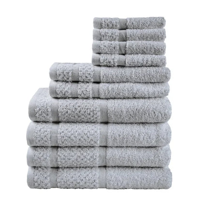 10 Piece Stack of gray towels of different sizes  on a white back ground. 