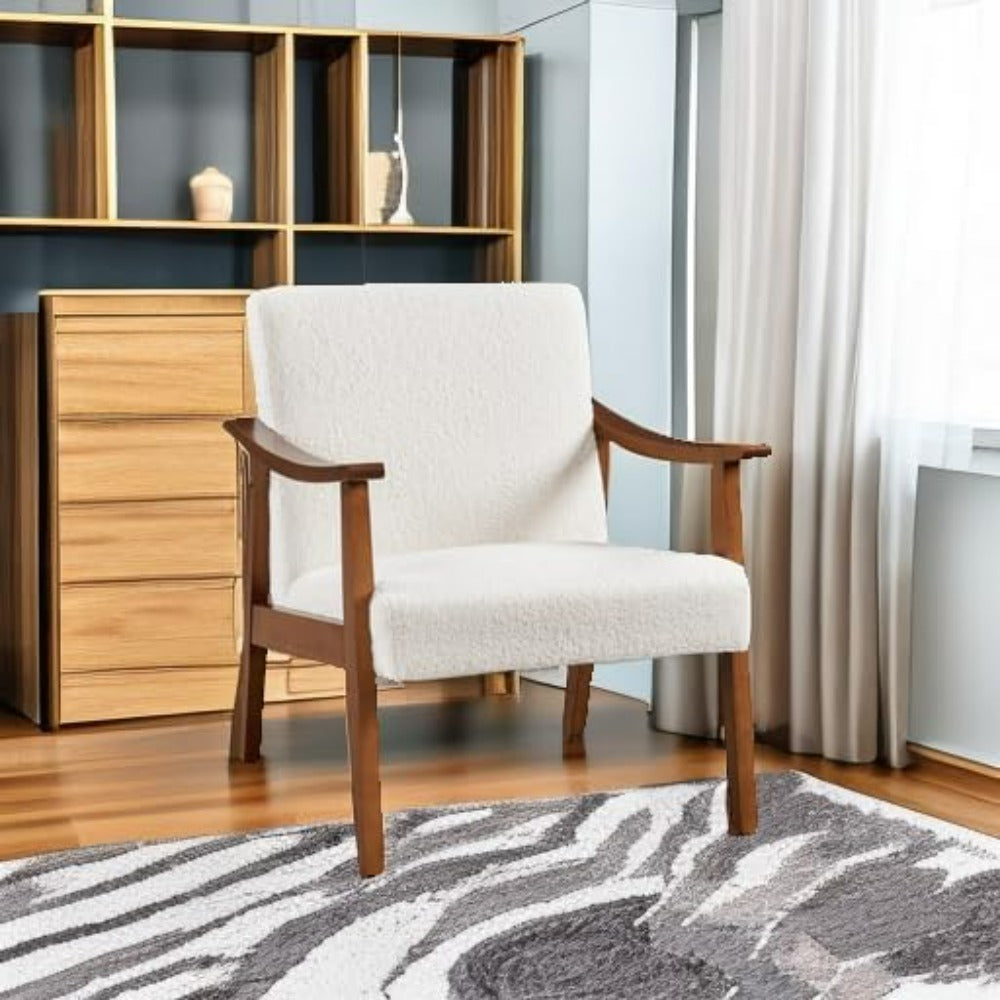 Accent chair with curved wood arms and high backrest in cozy room setup