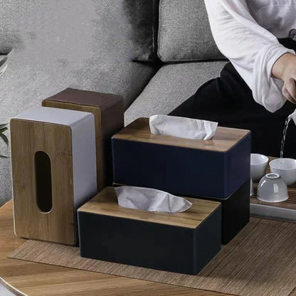 collection of tissue boxes in multiple colors on coffee table
