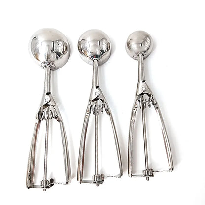 Rear view of three stainless steel scoops in small, medium, and large, displaying trigger handle and gear-driven mechanism.