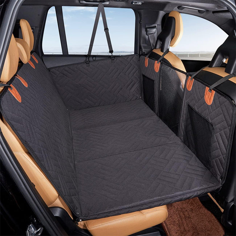 black quilted hammock dog seat cover installed with door protectors and mesh pockets