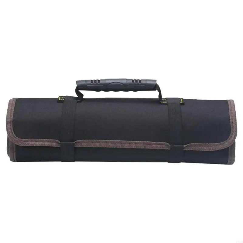 Black tool roll bag shown horizontally in rolled-up position with a sturdy molded handle, brown trim, and black straps. Designed for storing tools securely during transport.