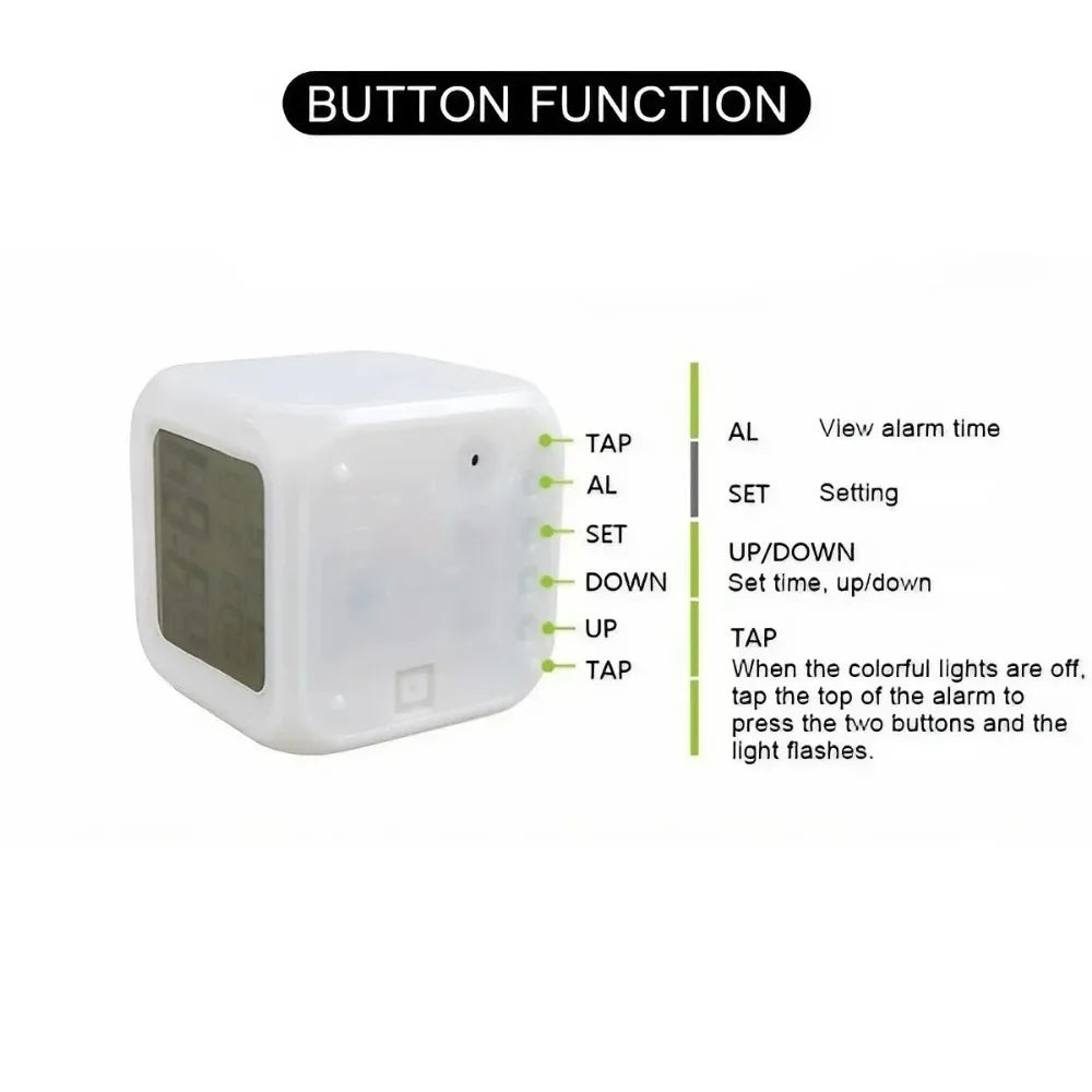 Close-up image of a white cube-shaped LED alarm clock with labeled side buttons, including TAP, AL, SET, DOWN, and UP. The diagram explains each button's function, such as setting time, viewing alarm, and activating colorful lights by tapping the top.