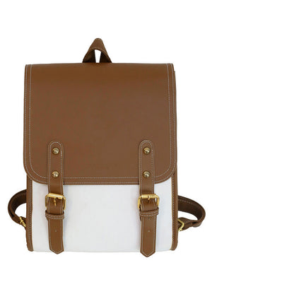 Clean front product shot of the brown and white fashion backpack isolated on white background, emphasizing structure and design details.