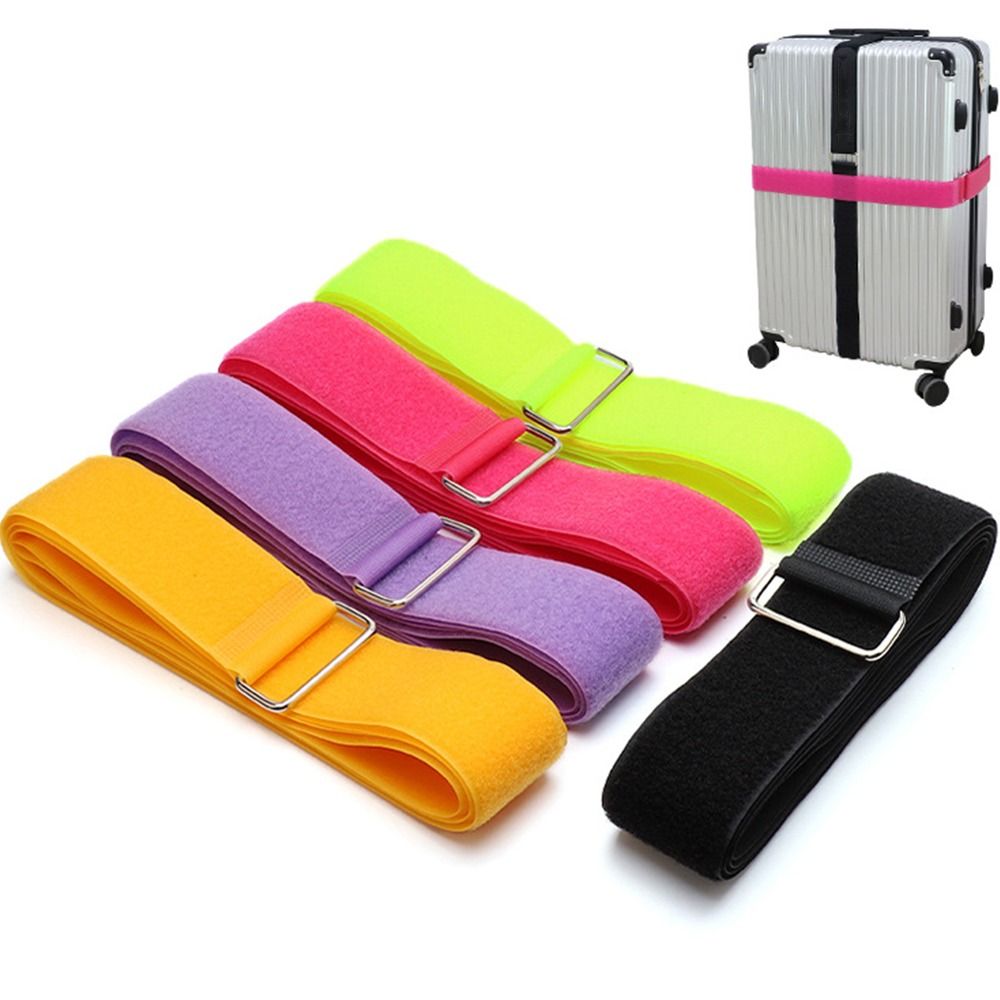 Five colorful luggage straps including black, yellow, pink, purple, and green, with suitcase example shown in use.