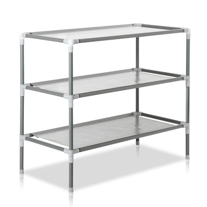 Full angled view of the 3-tier gray shoe rack made from metal pipes, plastic connectors, and fabric shelves.