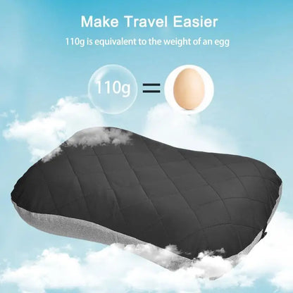 Promotional visual of the inflatable pillow floating among soft white clouds in a bright blue sky. A translucent graphic shows the comparison between the pillow’s weight (110g) and an egg, reinforcing its ultralight construction and suitability for travel, backpacking, and air travel.