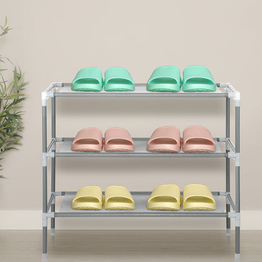 Front-facing view of the gray 3-tier shoe rack neatly holding multiple pairs of pastel-colored slippers.