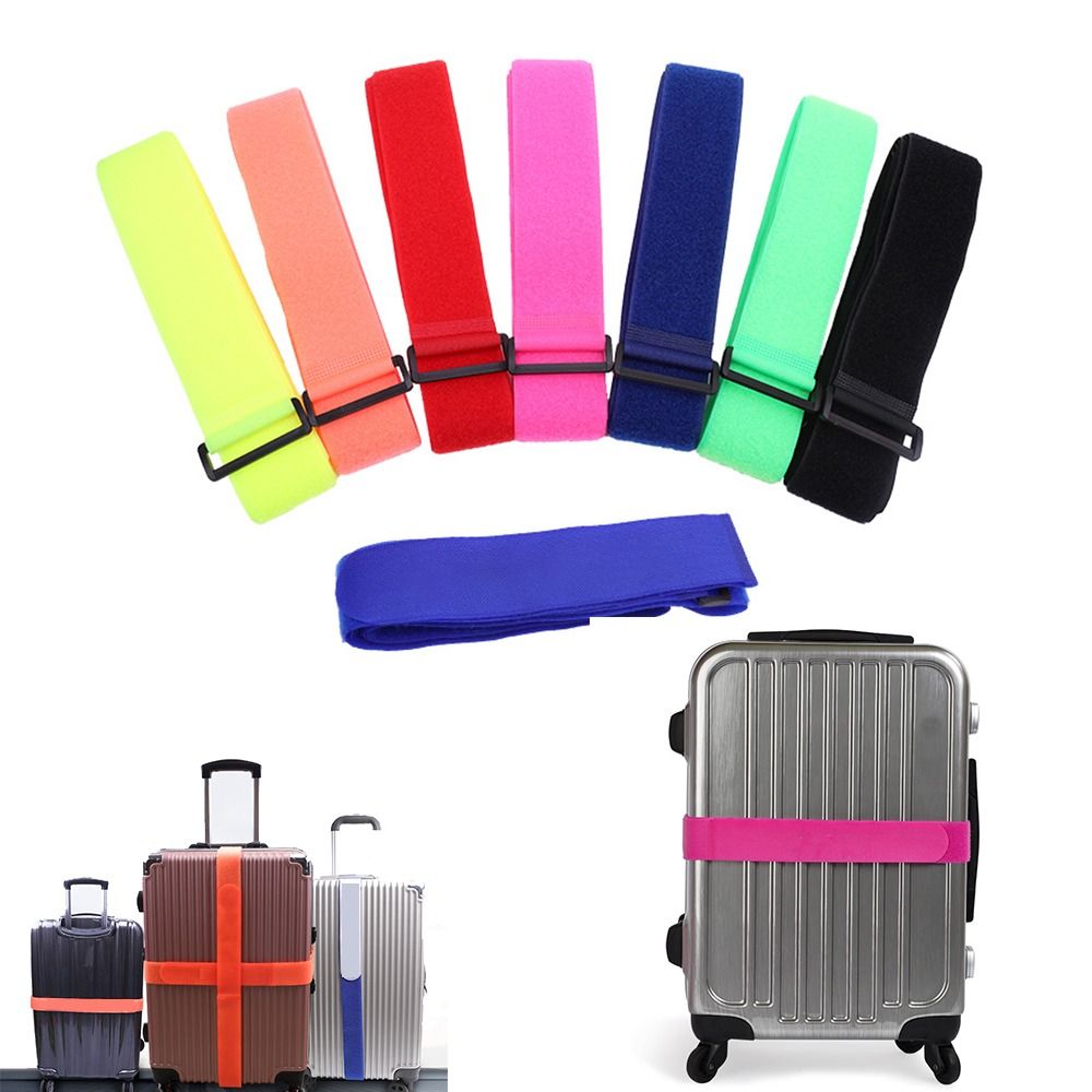Set of eight luggage straps in neon colors displayed above suitcases, showing how they secure different types of luggage.
