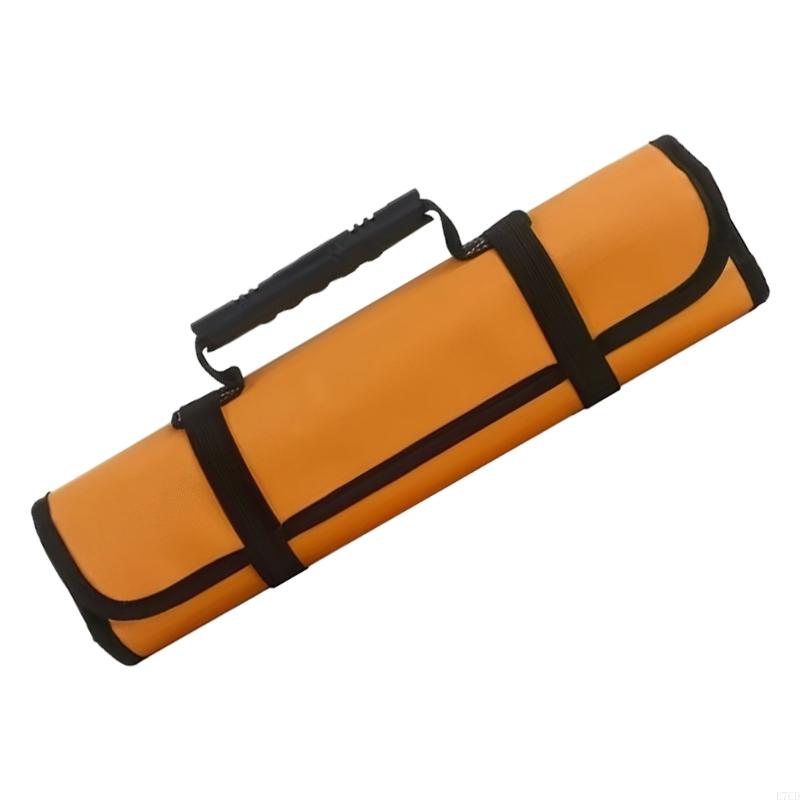 Rolled-up tool organizer in mustard yellow with black trim. Features a plastic handle and secure black straps for carrying, emphasizing its vibrant color and rugged utility.