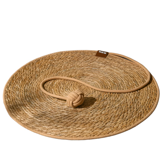 Eco-friendly round rattan cat scratcher mat with attached rope toy for interactive play