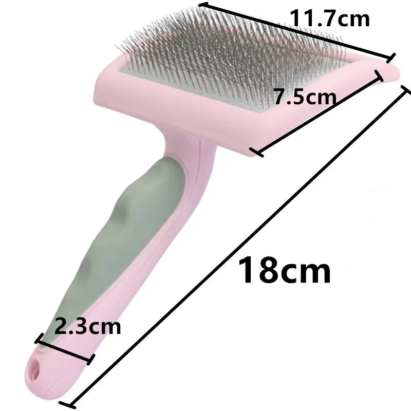 Pink grooming brush with angled view and measurement labels in centimeters