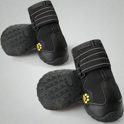 4 pc Black with a little yellow, Waterproof dog boots for medium and large dogs, featuring anti-slip soles, reflective strips for visibility, and adjustable straps for a secure fit. Ideal for rain, snow, and rough terrain. - Main image 