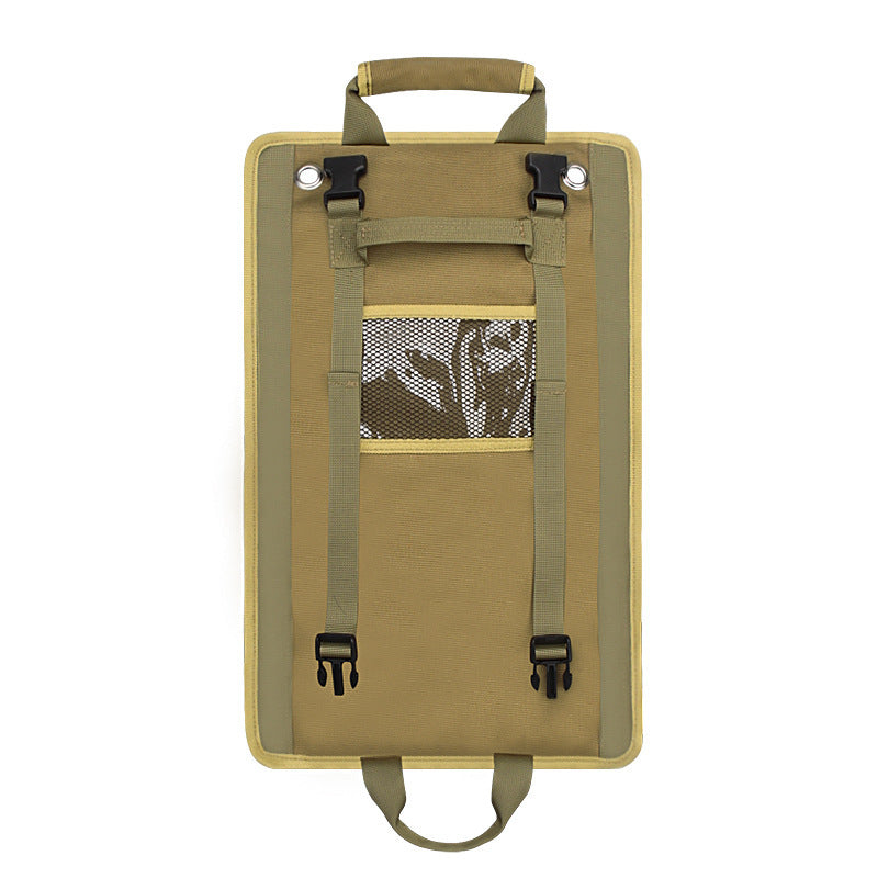  Rear view of the tool roll showing mesh pocket, adjustable hanging straps, and sturdy stitching, emphasizing vertical hanging functionality.