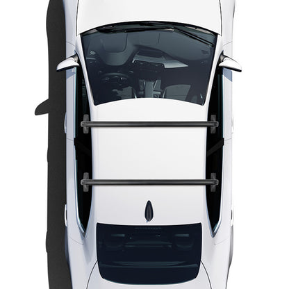 overhead image of a white 4-door sedan with two black cross bars positioned fore and aft across the roof