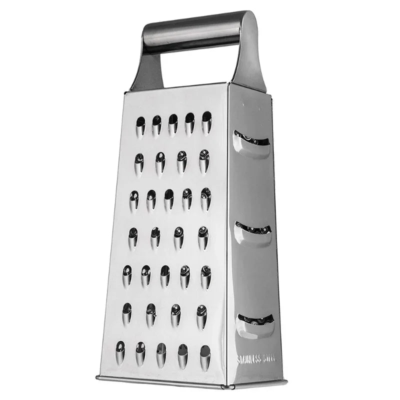 Upright stainless steel box grater with coarse grating surface facing forward, showing clean, reflective finish and sturdy handle.