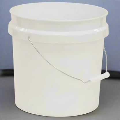 White plastic bucket with a handle on a gray background
