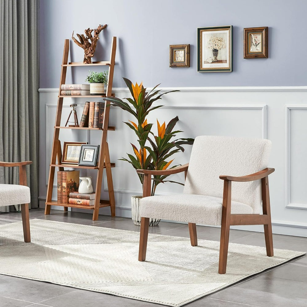 Mid-century modern accent chair in living room with white upholstery and wooden arms