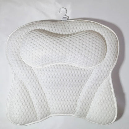  White 4D mesh bath pillow with built-in headrest and contoured support, hanging hook visible on white background.