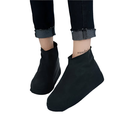 Black waterproof shoe covers isolated on white background