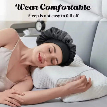 Woman peacefully sleeping on a pillow while wearing a black satin bonnet, with the text 'Wear Comfortable – Sleep is not easy to fall off' displayed above her. 