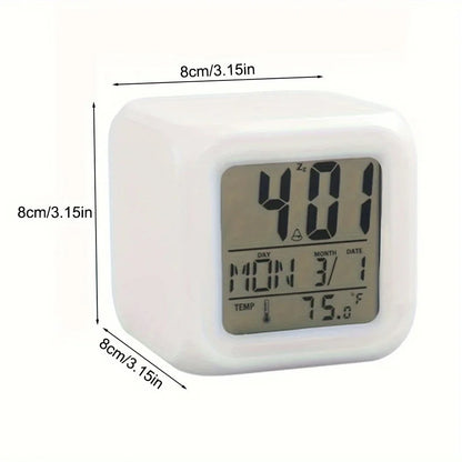 White cube-shaped digital alarm clock with a clear LCD screen displaying the time (4:01), day (Monday), date (3/1), and temperature (75.6°F). The clock measures 8 cm (3.15 inches) on all sides, as shown by labeled dimension arrows. Ideal for bedside use with multifunctional display features.