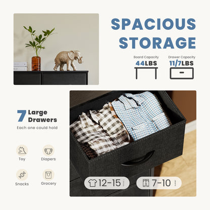 Storage capacity display of fabric drawer holding folded clothes, highlighting space for toys, diapers, and groceries