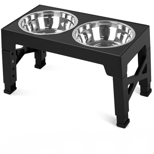 Black elevated dog bowl stand with two stainless steel bowls, shown on a white background. Adjustable plastic legs with rubber feet visible.