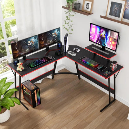 Gaming desk with RGB setup in a sunlit room featuring plants and wall decor.
