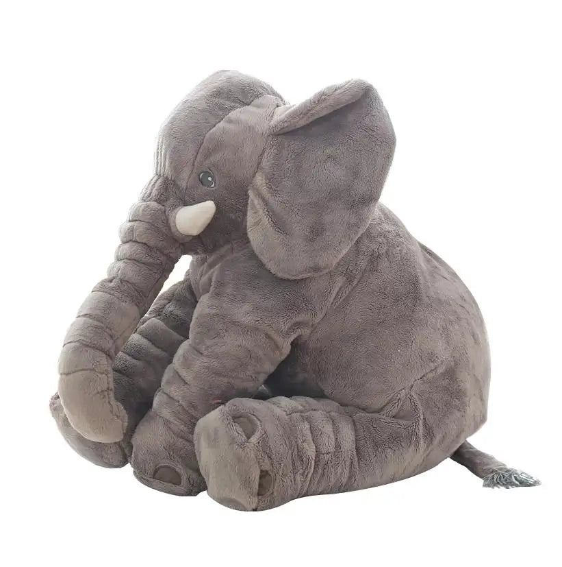 Gray elephant plush toy in side view sitting position white background