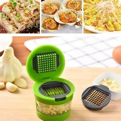 Open green garlic press with dual blade attachments next to diced garlic and food prep examples