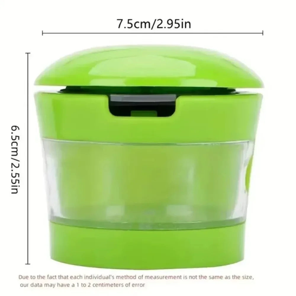 Green manual garlic and vegetable dicer with clear chamber, showing product dimensions in centimeters and inches