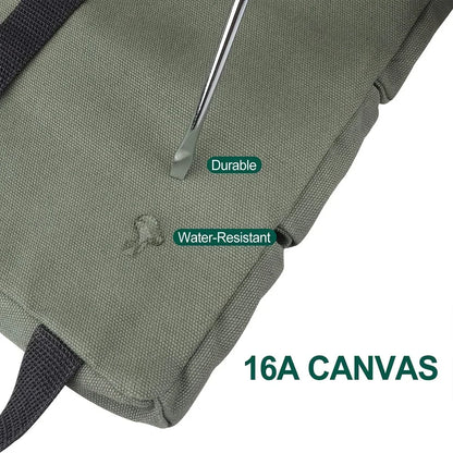 Close-up of green 16A canvas tool bag fabric showing water-resistant and durable properties with a screwdriver pressing against the surface.