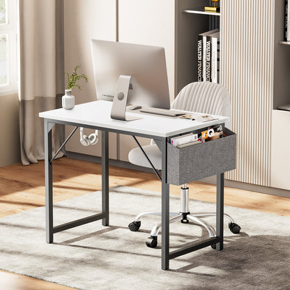 Home office setup featuring a white computer desk with storage, desktop monitor, and rolling chair