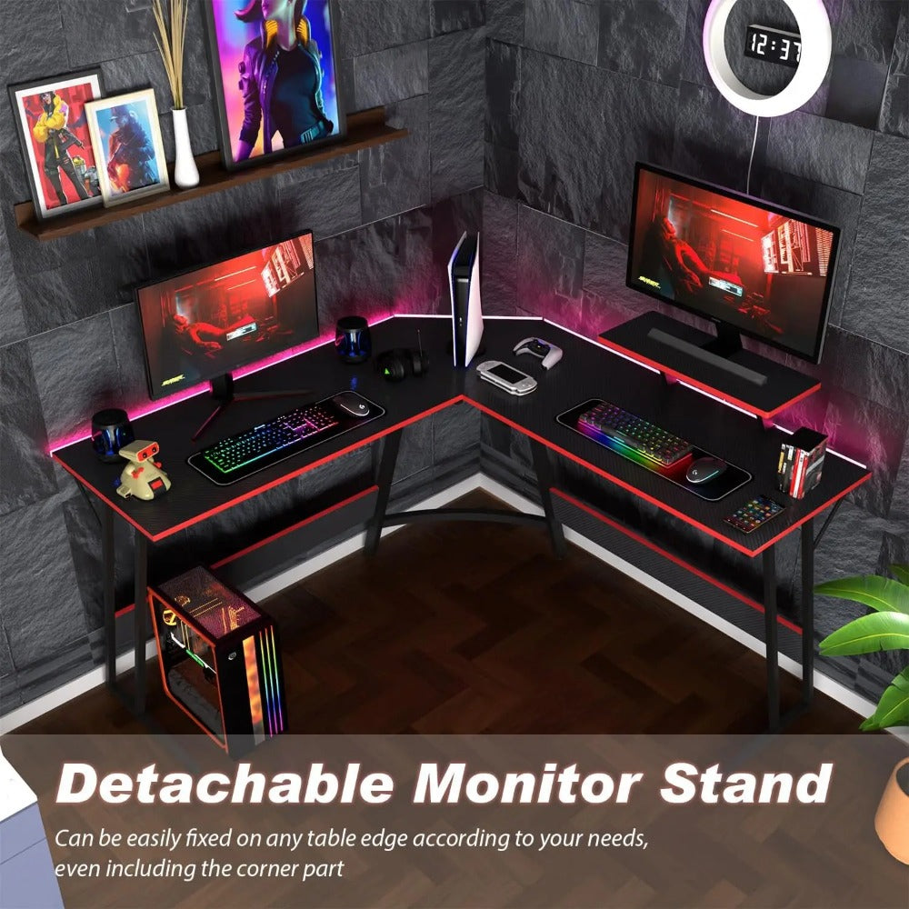 Gaming corner setup with LED-lit L-shaped desk and detachable monitor stand.