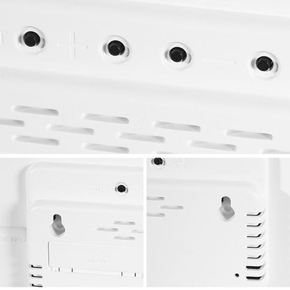 Close-up of LED wall clock rear panel showing control buttons and mounting holes