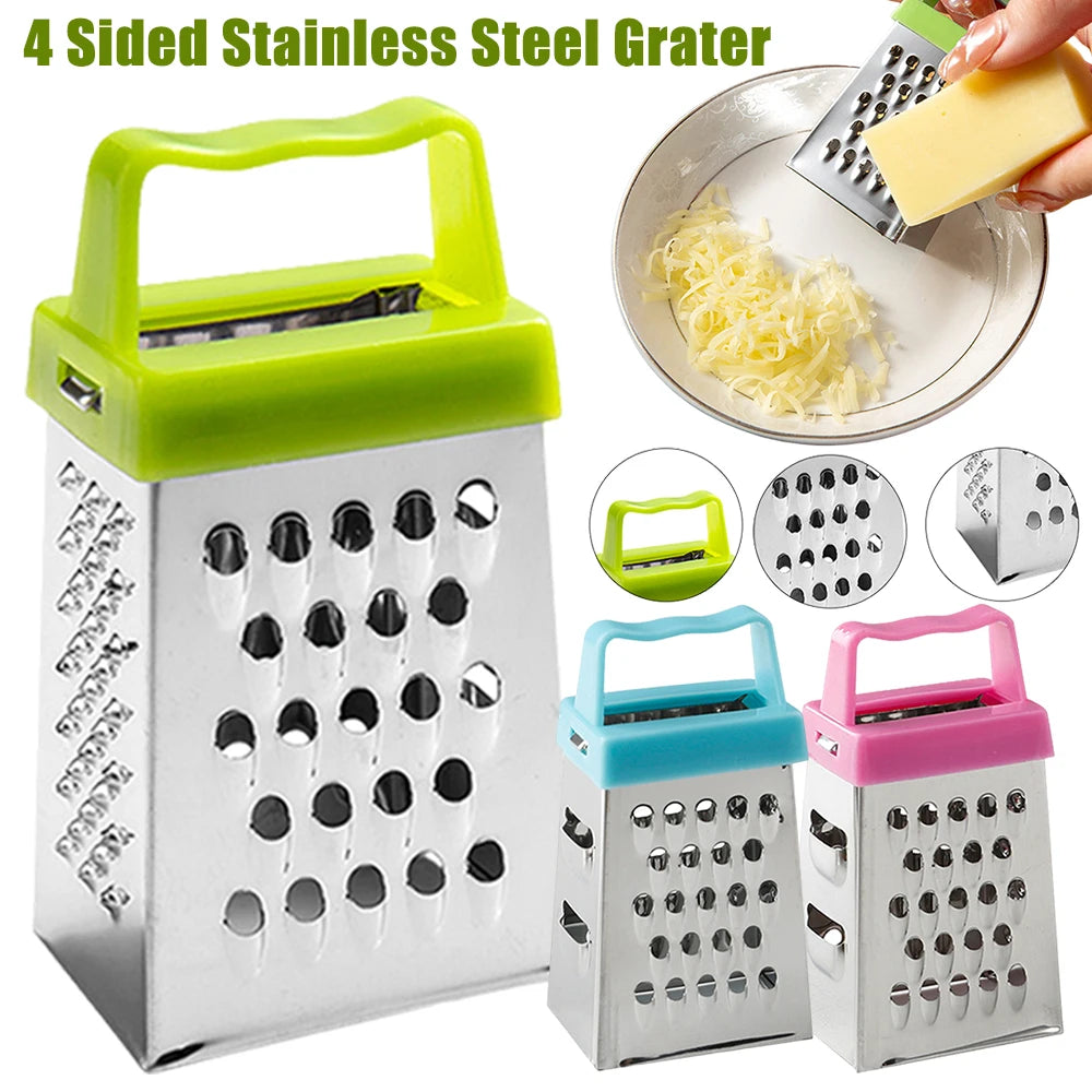 Mini 4-sided stainless steel box grater with green handle placed on a wooden board, next to shredded cheese and mozzarella ball