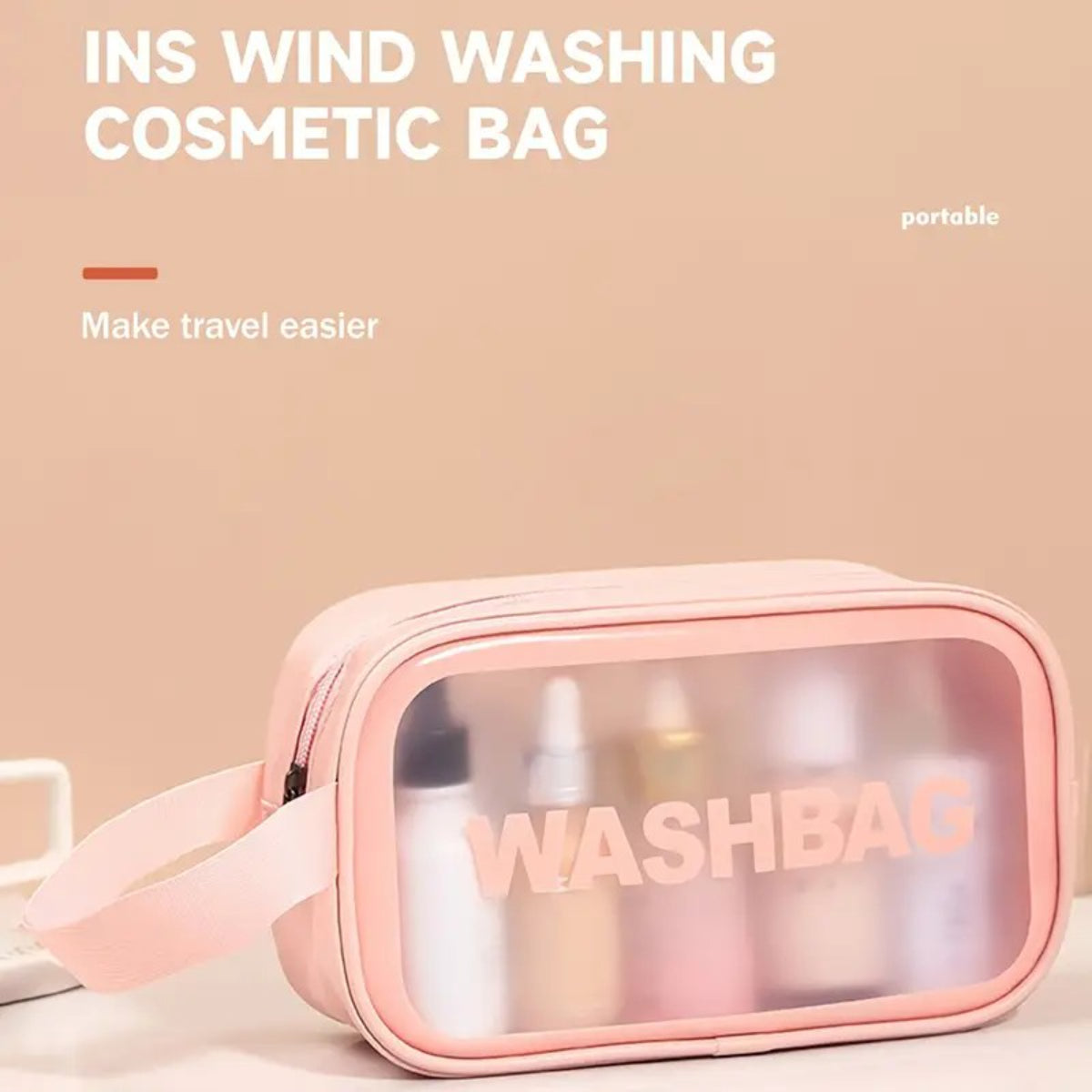 Front view of a pink waterproof makeup organizer bag with transparent window panel displaying cosmetic bottles inside.