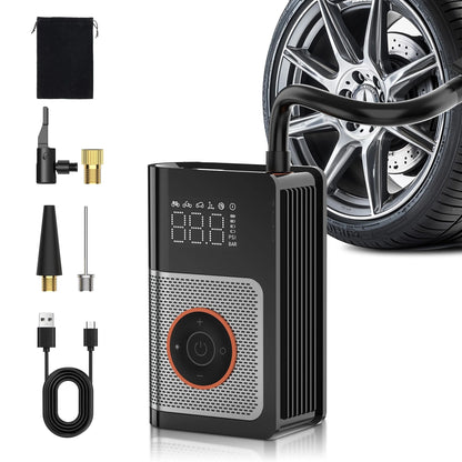 Tire inflator with attachments next to a car wheel