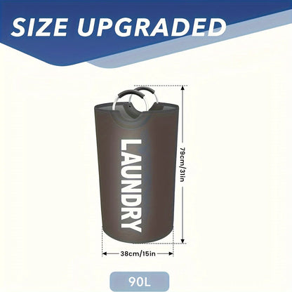A product infographic showing a black cylindrical laundry hamper with the word "LAUNDRY" printed vertically in white. Dimensions are marked as 79cm tall and 38cm wide, with a 90L capacity. Includes silver ring handles and text "SIZE UPGRADED" at the top.