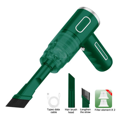 Green vacuum cleaner kit showing full accessory layout including filter, brush, and USB cable