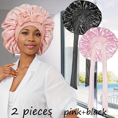 Smiling woman wearing pink satin bonnet with two bonnets displayed in background